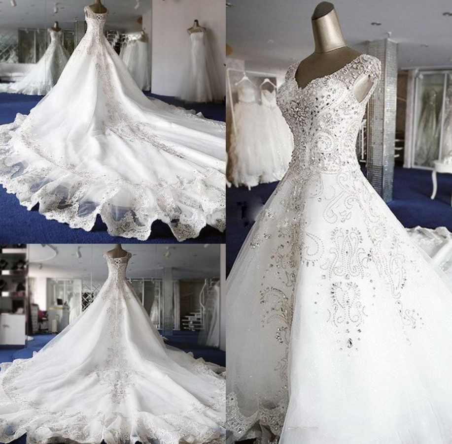 Designer Wedding Dresses Luxury Crystals Beading Chapel Train V Neck Sleeveless Tulle Lace Up Back Wedding Bridal Gown Vestidos