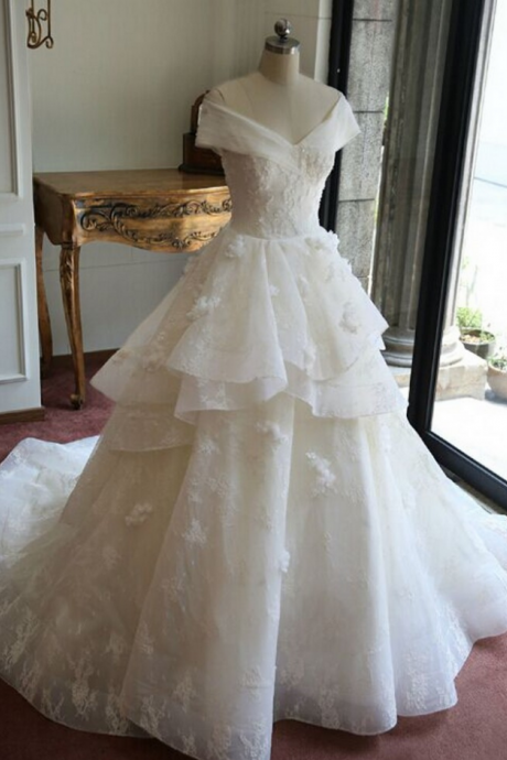 Off-the-shoulder A-line Wedding Dress Featuring Floral Lace Appliqués and Court Train