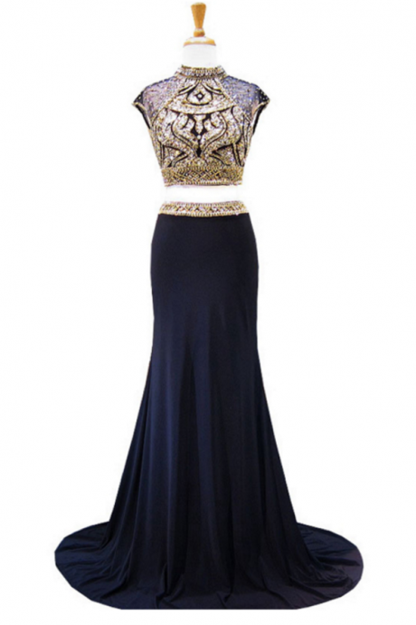 The Long, Sparkly Long Ball Gown With A High-necked, Beaded Crystal Floor-length Crystal Floor-length Gown With A Pair Of African Navy And Navy