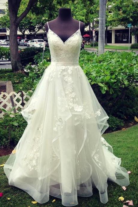 A-line Spaghetti Straps Sweep Train Wedding Dress With Appliques